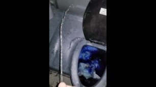Pissing all over a Porta Potty