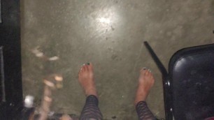 Sarah barefoot at theater starting at the gloryhole